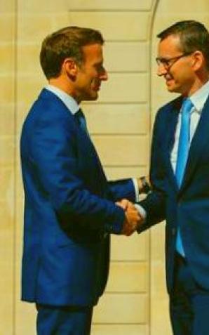 Premier w Paryżu: zjednoczeni potrafimy się lepiej obronić przed kryzysami